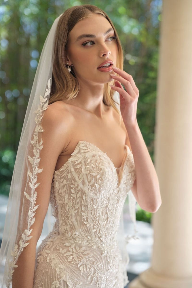 
                      
                        Carrie Strapless Beaded Leaf Motif Mermaid Wedding Gown
                      
                    